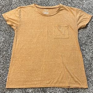 Light orange women’s tee with pocket